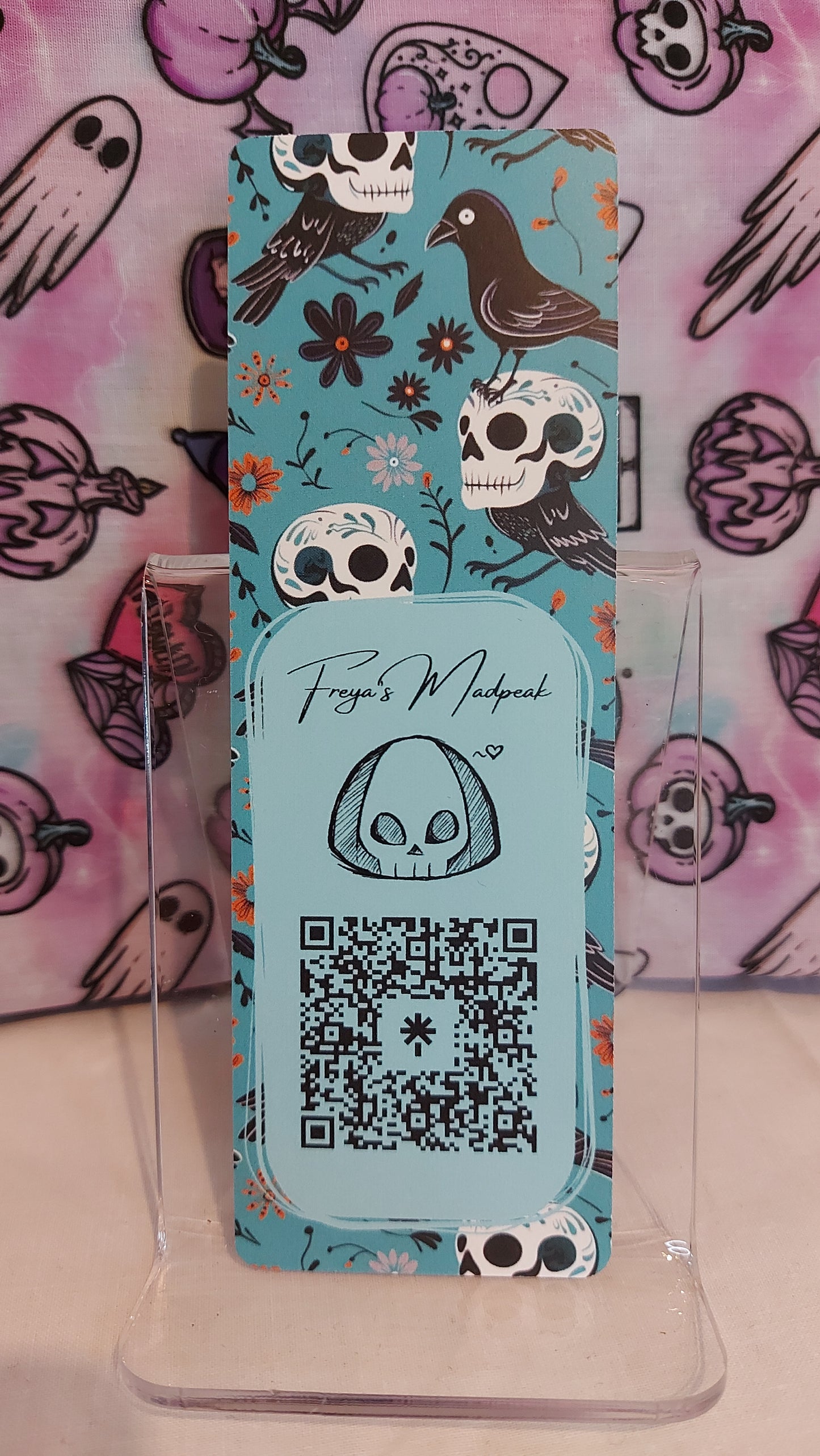 Teal skulls and ravens bookmark