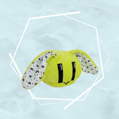 Small green bunny plushie with ribbons