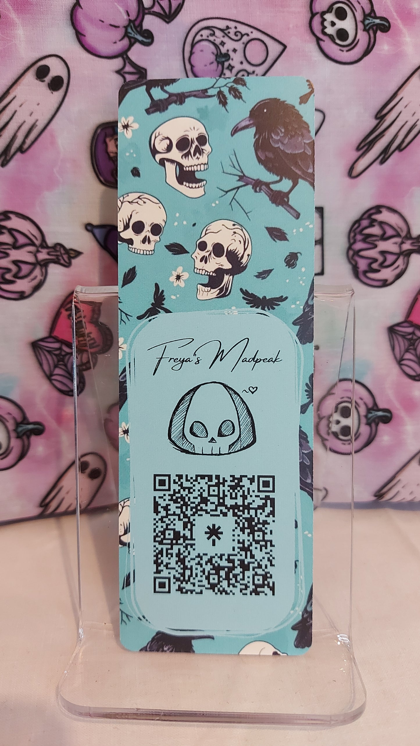 Turquoise skulls and ravens bookmark