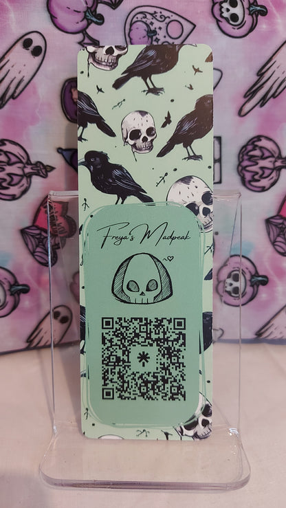 Light green skulls and ravens bookmark