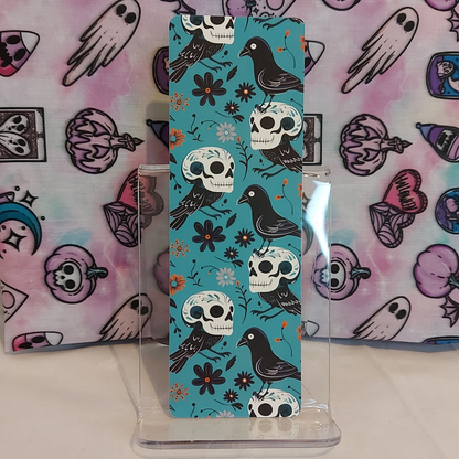 Teal skulls and ravens bookmark