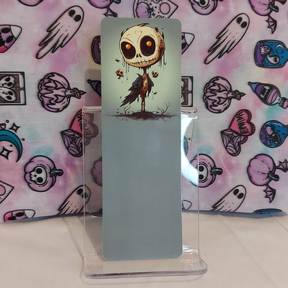 A freaky, quirky bookmark featuring a gothic style illustration of a skull on a bird, made for readers and book lovers as an accessory