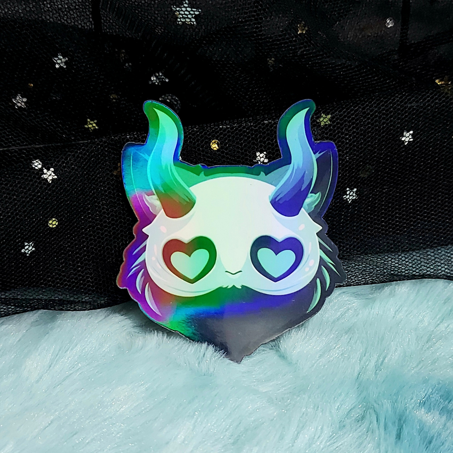 Teal monster holographic sticker