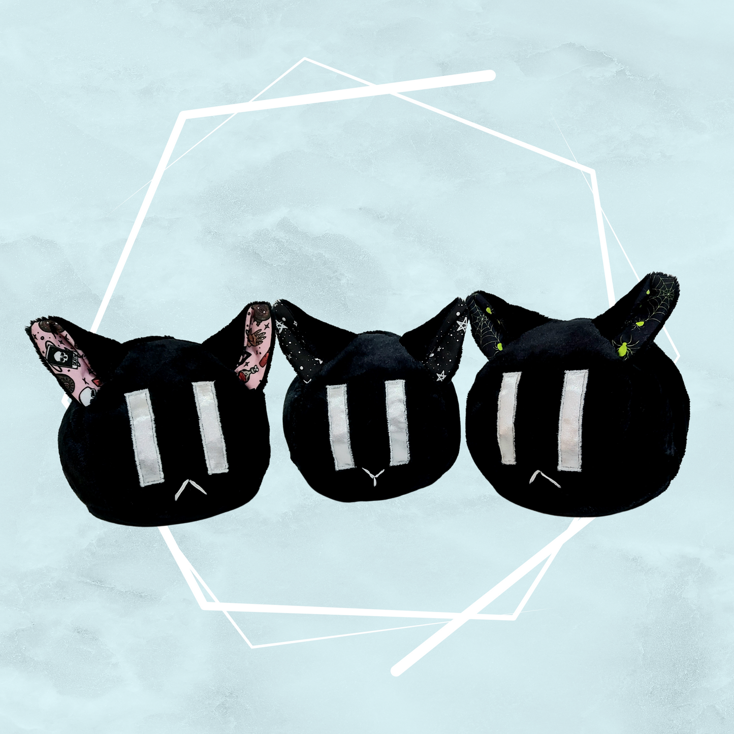 Three black gothic themed, unique, handmade soft toys crafted by artist Freya's Madpeak