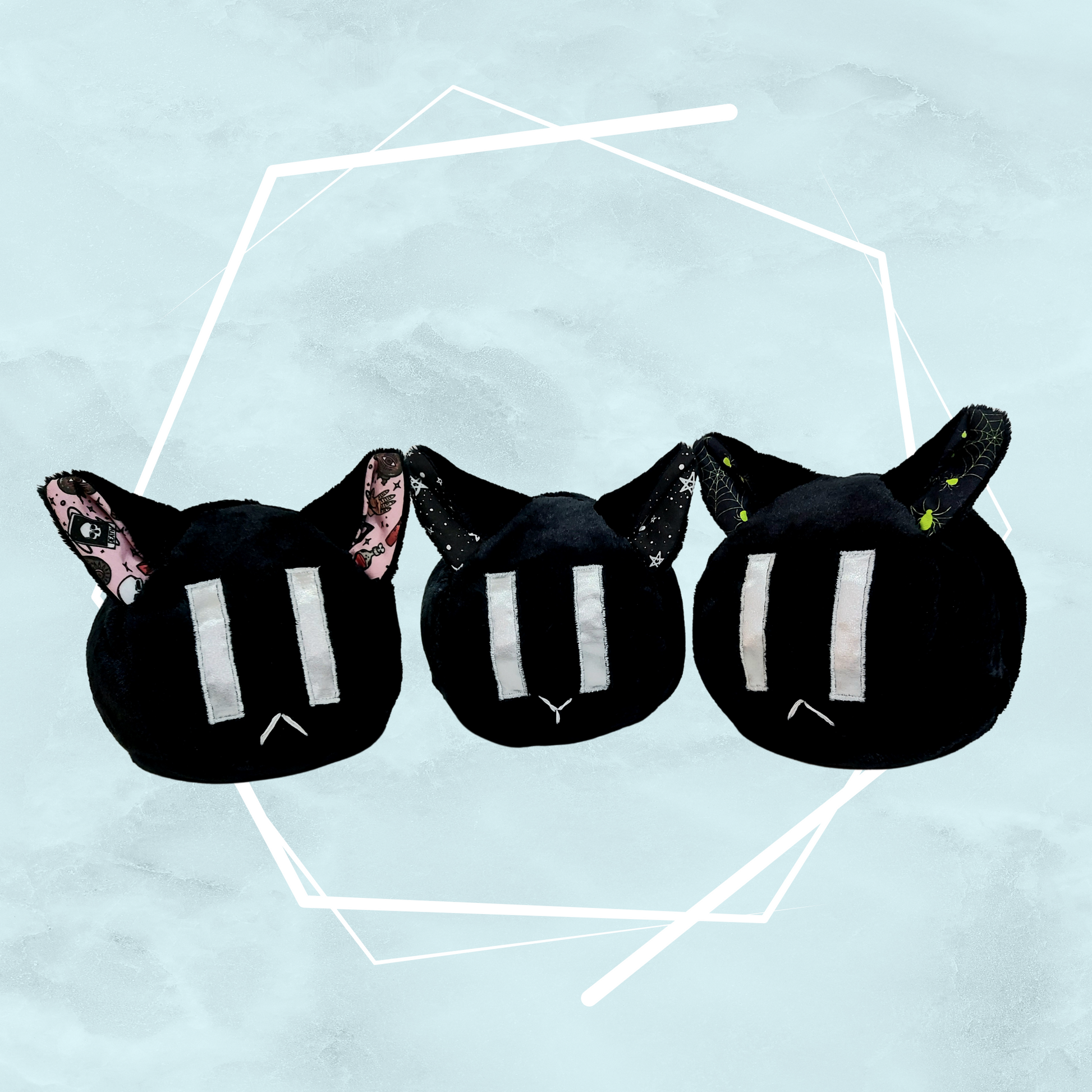 Three black gothic themed, unique, handmade soft toys crafted by artist Freya's Madpeak