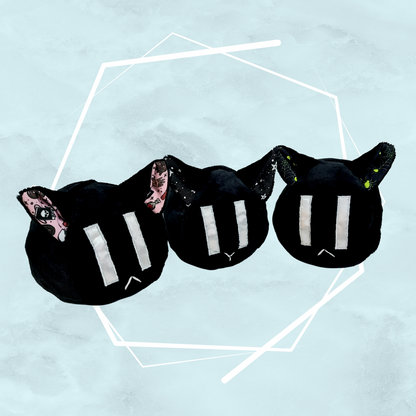 Small black kitty plushies