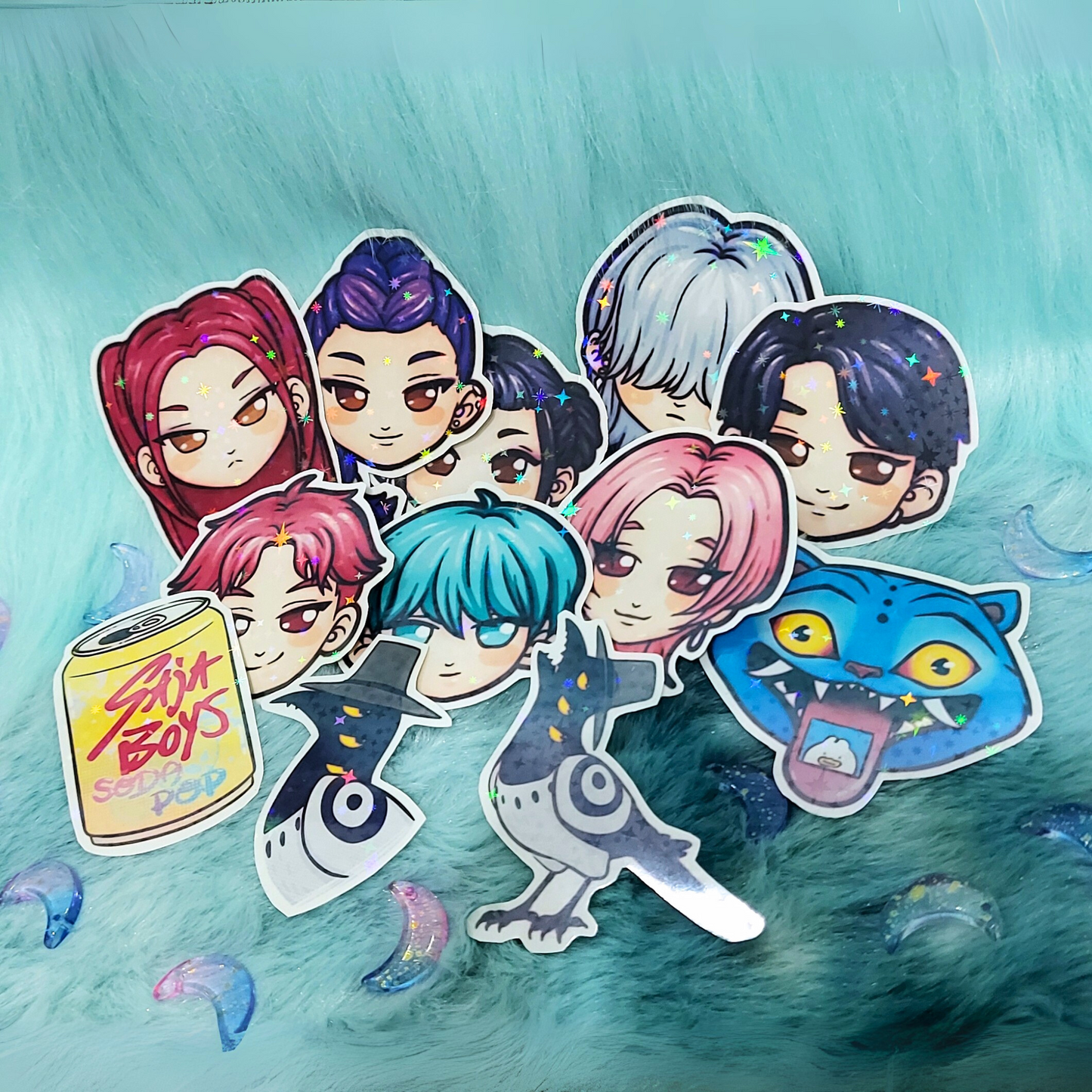 vinyl waterproof stickers resembling Kpop demon hunters characters with holographic effect made by uk artist